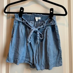Blue paper bag shorts from Francesca‘s